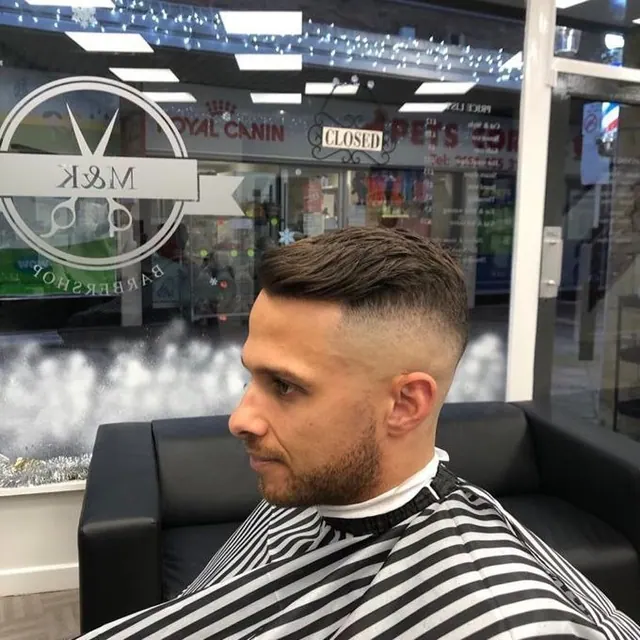 The chairs and mirrors at M&K Barbershop